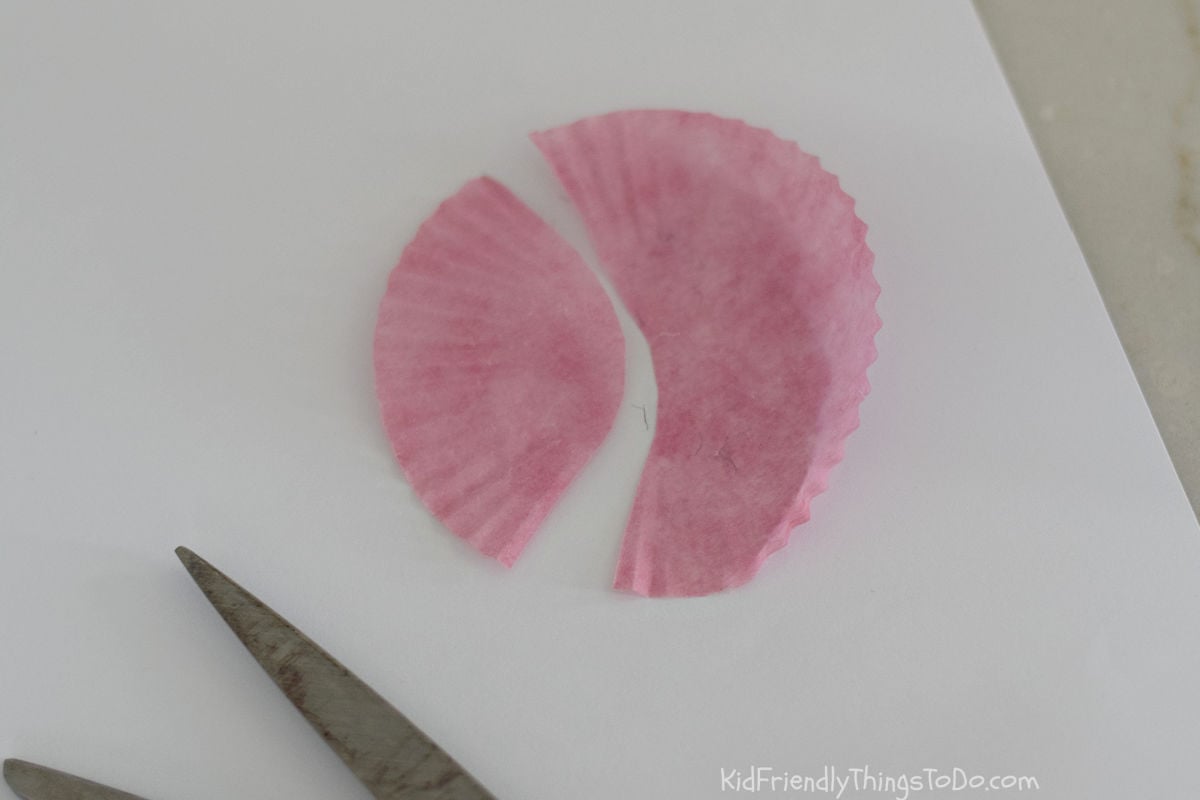 cupcake wrapper cut into a C shape for caterpillar craft 