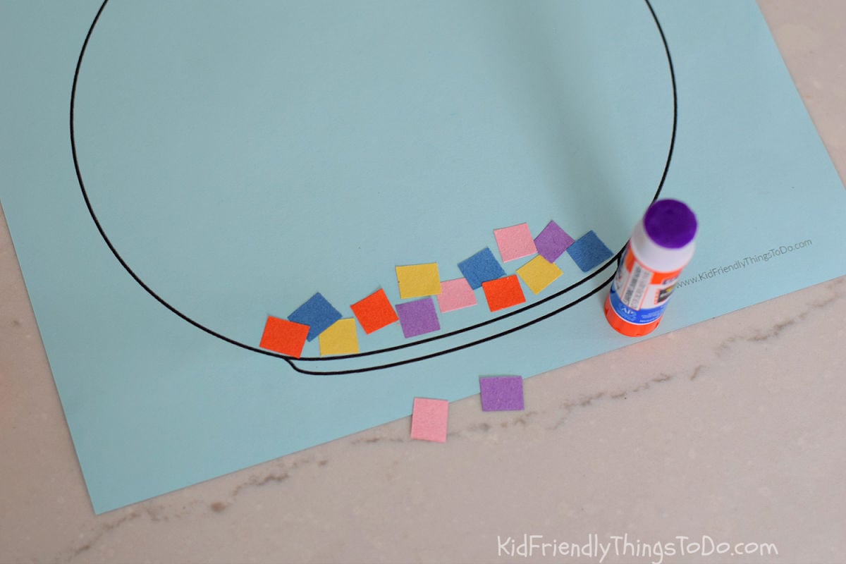 adding paper rocks to fish bowl printable craft