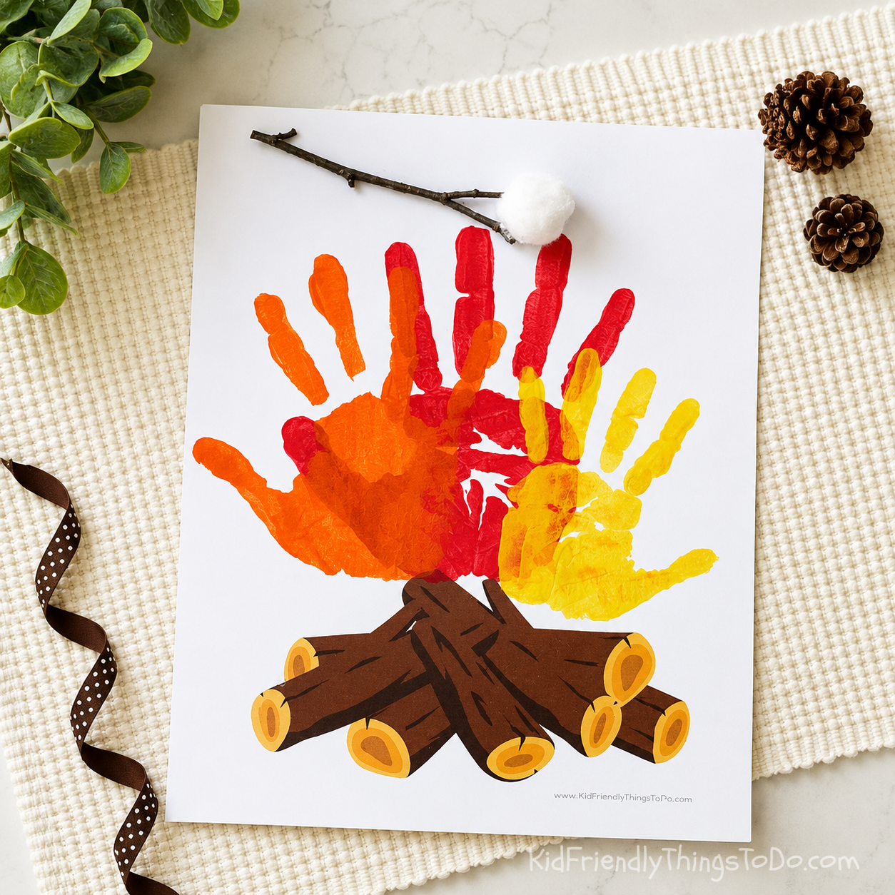 campfire handprint craft with printable logs for kids