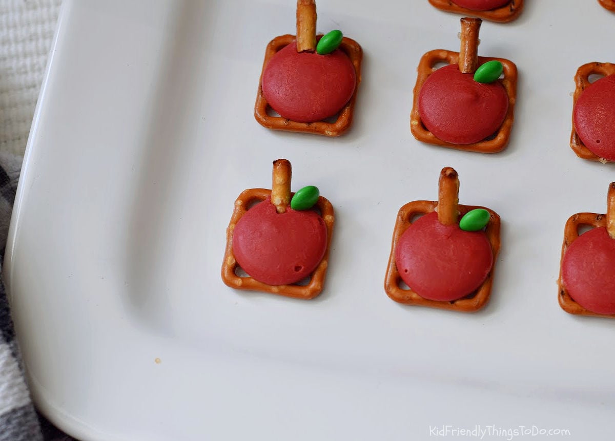 Close-up of Apple Pretzel Bites fall snack showing pretzel stem and M&M leaf detail