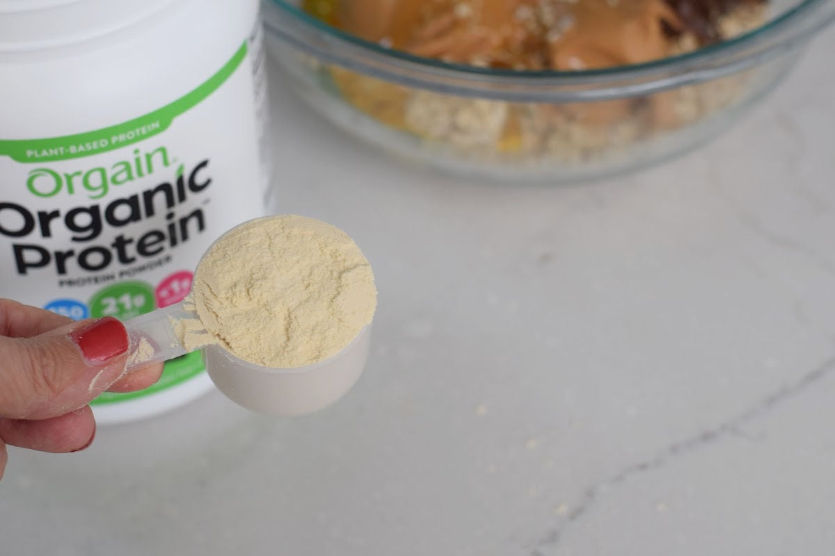 a scoop of protein powder for no-bake protein balls 