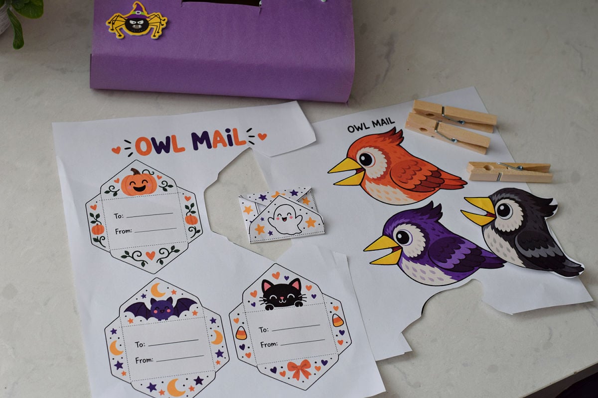 Owl Mail printable owls and Halloween envelope templates beside wooden clothespins.