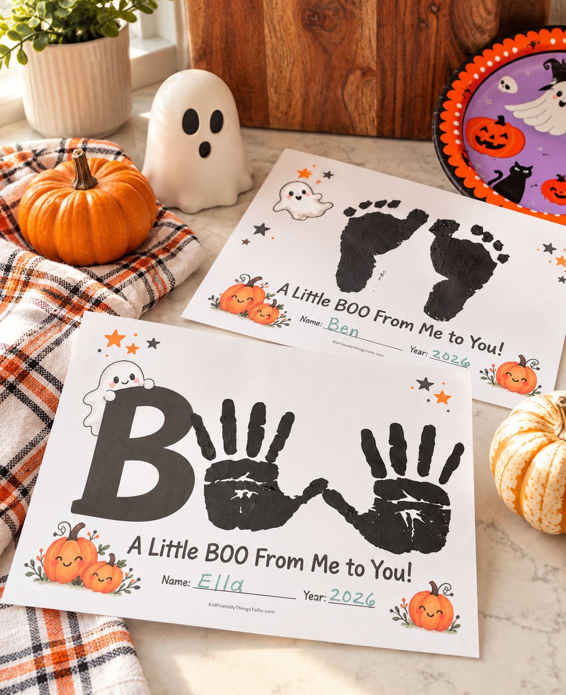 Halloween handprint and footprint art completing the word BOO on A Little BOO From Me to You keepsake printables.