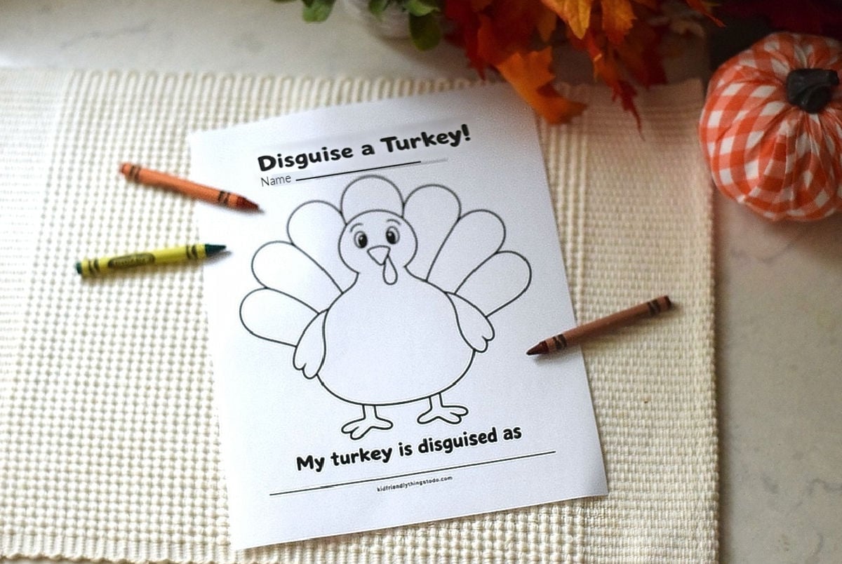 Disguise a turkey template with crayons on a cream mat beside an orange gingham pumpkin.