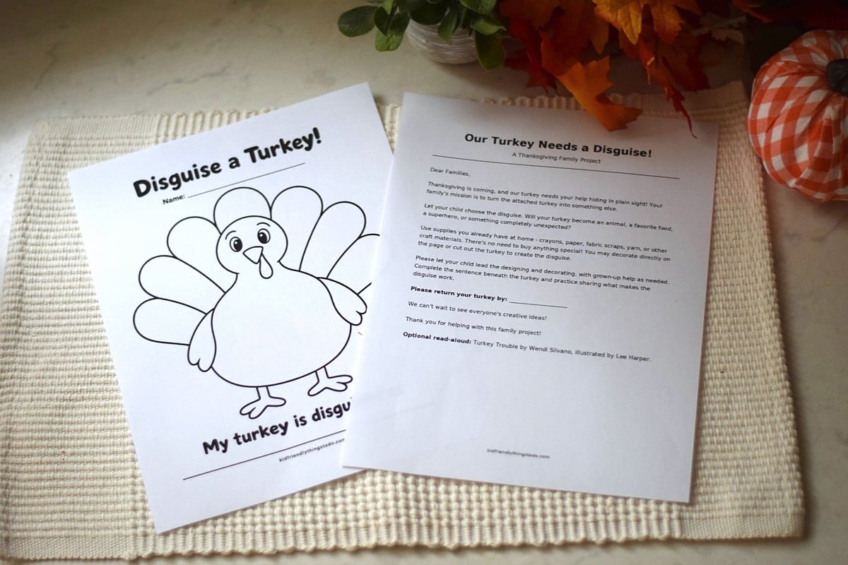 Printed turkey disguise template and take-home family letter displayed together on a cream mat with fall decorations.